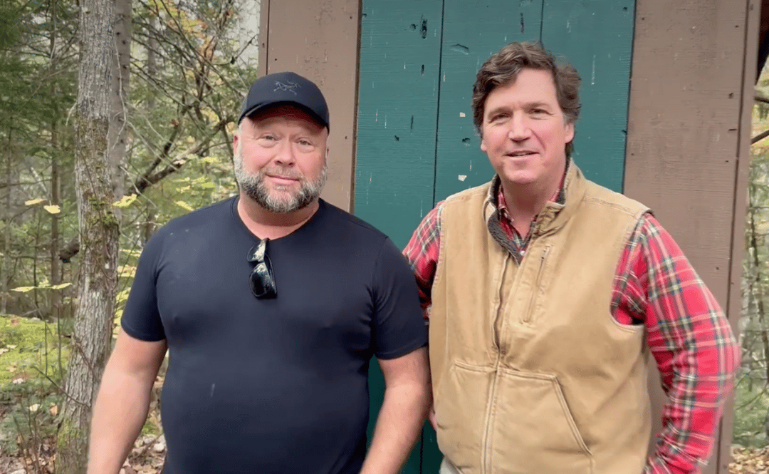 Alex Jones and Tucker Carlson, who introduces his interlocutor as “the most censored person in the English-speaking information space.” Screenshot from the interview