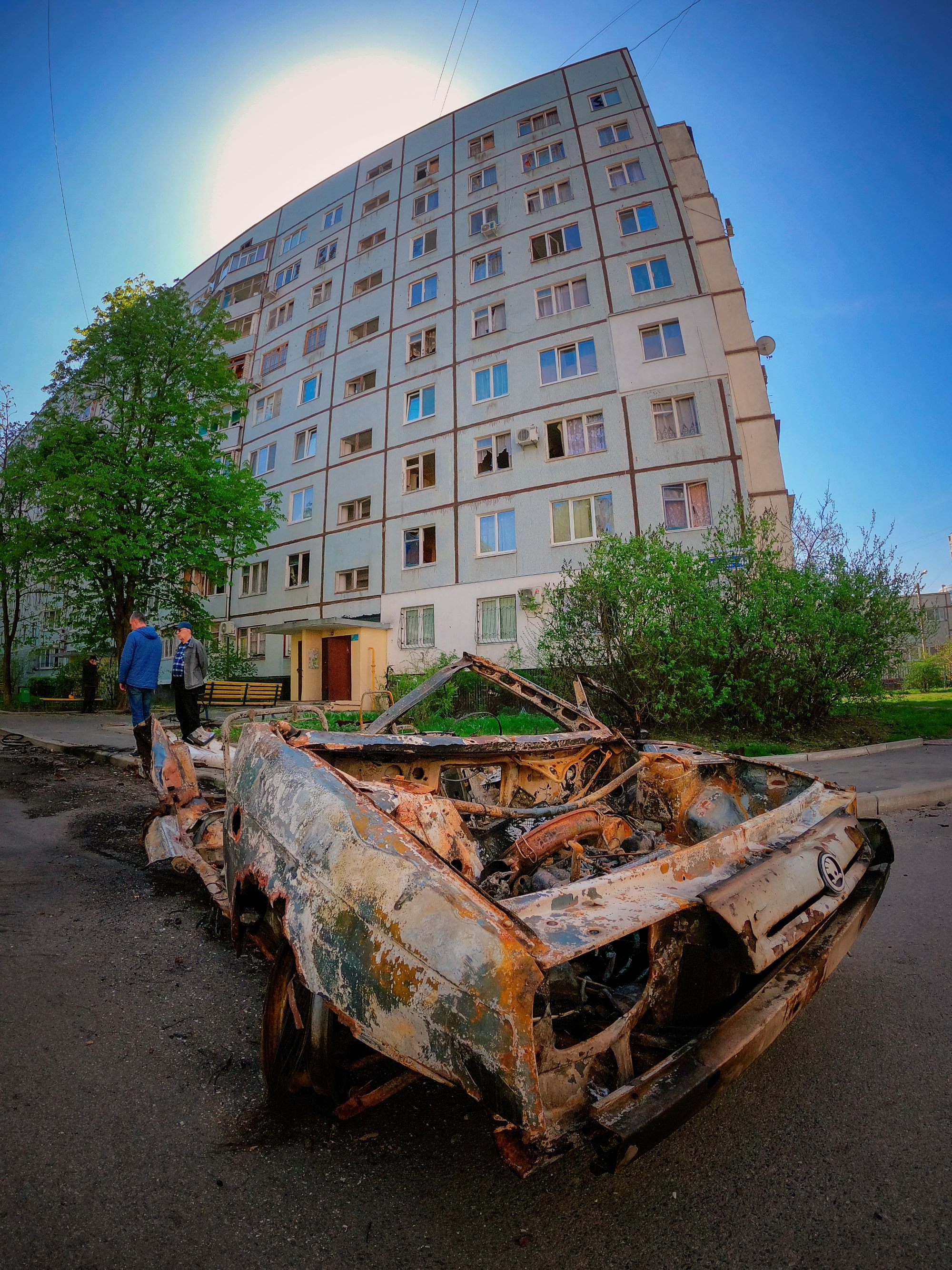 A burnt-out car near the entrance of an apartment building where Vadim used to go to feed his neighbour’s cats. The house was hit by four "Grad" shells, and 15 more shells hit the area nearby.