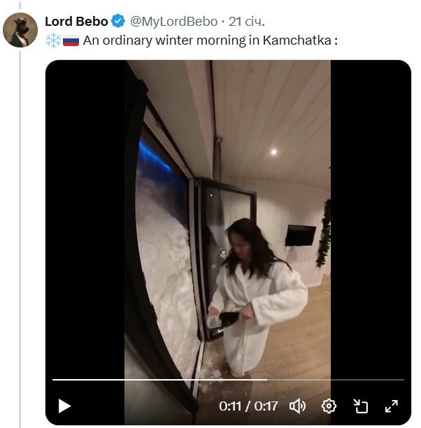 In this video, a resident of the Kamchatka Peninsula stores what appears to be a bottle of prosecco in a snowdrift outside her door