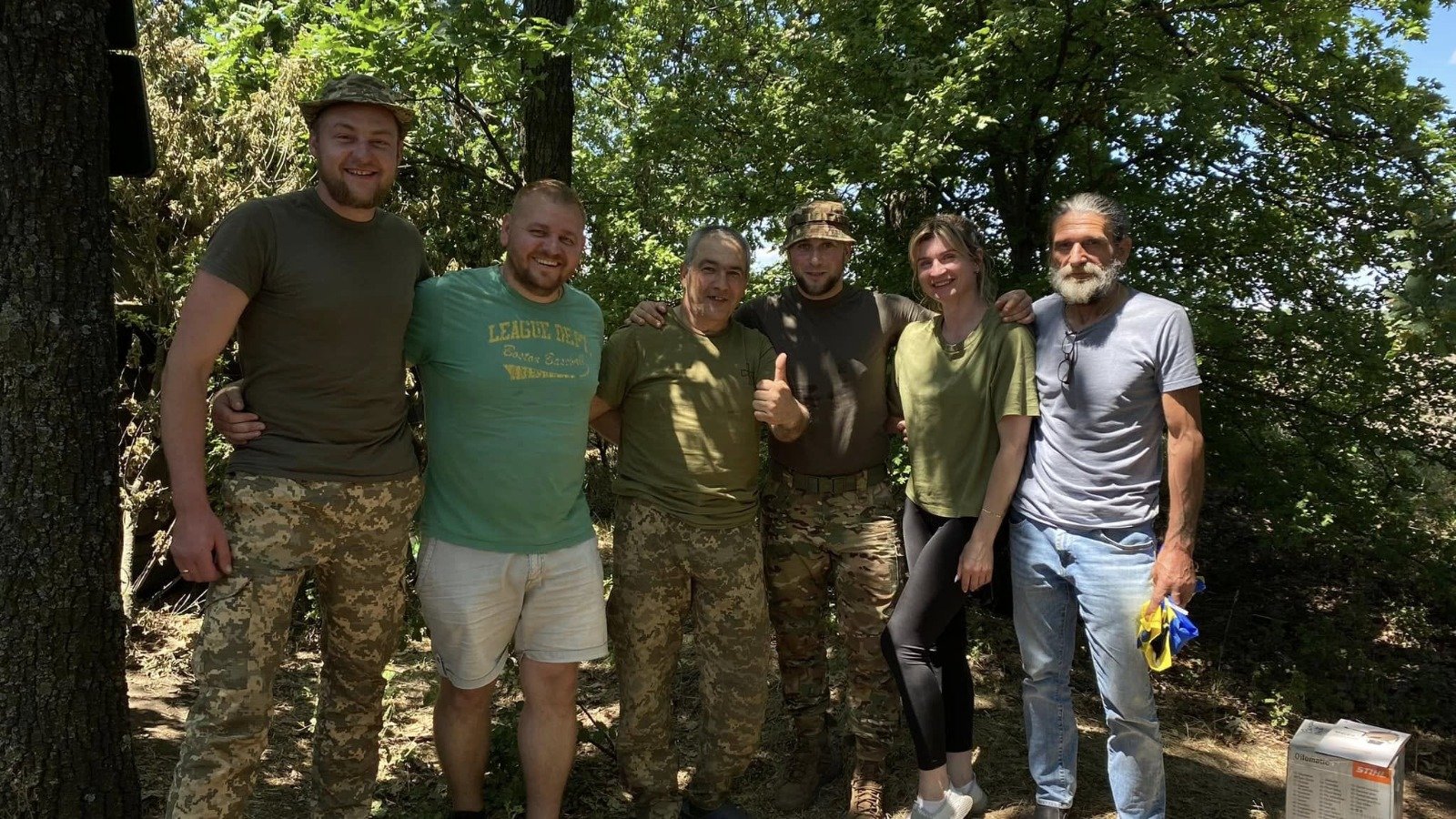 Любов Оліградська з українськими захисниками