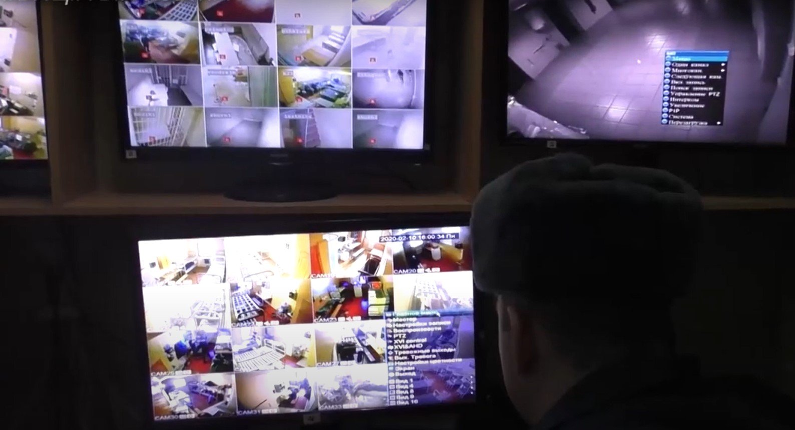 A warden in the Vyazemskoe Detention Center watches prisoners through surveillance cameras. Screenshot from a video by the Vyazemsky Information Centre prepared for the celebration of the center's 85th anniversary in 2020