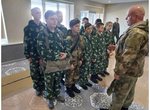 Попередній перегляд The military-patriotic club "Black Fox" at a training session on parachute packing and donning, disassembling and assembling the AKS-74 rifle